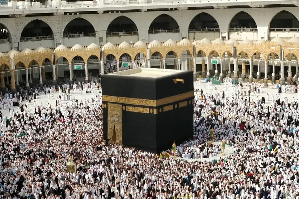 The Kaaba surrounded by pilgrims at Masjid al-Haram, Makkah